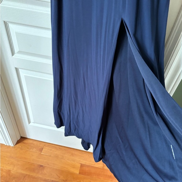 Navy blue fully lined ballgown with cutouts covered with navy, sheer mesh. - Picture 4 of 11